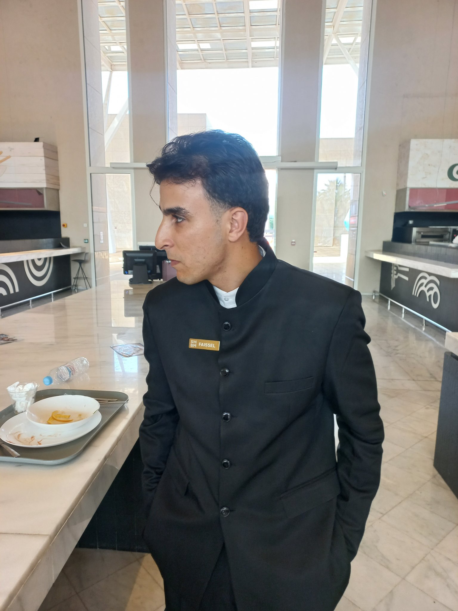 Portrait of Faissel Tidnassi in professional uniform